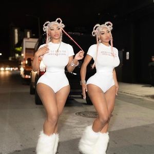 Small white graphic tee. Trending and worn by ice spice and clermont twins.